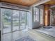 Bright sunroom with lots of windows and a view to the outside yard at 351 W 10Th Ave, Mount Dora, FL 32757