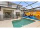 Private pool area with a safety fence and a vibrant mural, perfect for Gathering fun at 4847 Clock Tower Dr, Kissimmee, FL 34746
