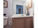 Guest bathroom with vanity and a large mirror at 2030 Alfredo Ave, The Villages, FL 32159