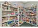 Recreation room featuring shelves full of games and puzzles and ample space for activities at 22204 Caledonia Dr, Leesburg, FL 34748