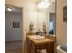 Clean bathroom with single sink and mirror at 2479 Cedar Key Ln, The Villages, FL 32162