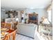 Open living room with a view into the kitchen and dining area at 2479 Cedar Key Ln, The Villages, FL 32162