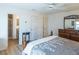 Main bedroom with ensuite bathroom and walk-in closet at 2479 Cedar Key Ln, The Villages, FL 32162