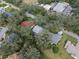 Aerial view of house and surrounding homes at 25813 Glen Eagle Dr, Leesburg, FL 34748