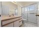 Bathroom with shower and single vanity at 25813 Glen Eagle Dr, Leesburg, FL 34748