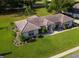 Home's roofline and landscaping from above at 6178 Spinnaker Loop, Lady Lake, FL 32159