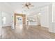 Open concept dining area with kitchen and sunroom views at 6178 Spinnaker Loop, Lady Lake, FL 32159