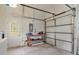 Garage with workbench and extra storage at 6178 Spinnaker Loop, Lady Lake, FL 32159