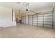 Spacious garage with overhead storage at 6178 Spinnaker Loop, Lady Lake, FL 32159