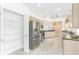 Bright kitchen pantry with ample shelving for storage at 6178 Spinnaker Loop, Lady Lake, FL 32159