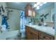 Bathroom with granite countertop and bathtub at 1314 Lajolla Cir, The Villages, FL 32159