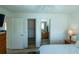 Bedroom with access to bathroom and closet at 1314 Lajolla Cir, The Villages, FL 32159