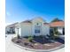 One-story house with a circular driveway and well-maintained landscaping at 1314 Lajolla Cir, The Villages, FL 32159