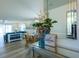 Bright and airy living room with a view into the dining area at 1314 Lajolla Cir, The Villages, FL 32159