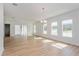 Bright dining room with hardwood floors, large windows and chandelier at 14256 Crest Palm Ave, Windermere, FL 34786