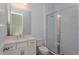 Clean bathroom with a white vanity and glass shower at 14421 Crest Palm Ave, Windermere, FL 34786