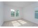 Well-lit bedroom featuring neutral tones and carpet at 14421 Crest Palm Ave, Windermere, FL 34786