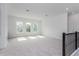 Bright loft area with neutral carpeting and lots of natural light at 14421 Crest Palm Ave, Windermere, FL 34786