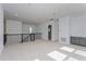 Spacious loft area with neutral carpeting and a view of the staircase at 14421 Crest Palm Ave, Windermere, FL 34786