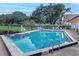 Inviting community pool with ample deck space at 2502 Loch Ness Ct, Leesburg, FL 34788