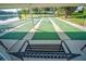 Enjoy leisurely shuffleboard games by the lake at 2502 Loch Ness Ct, Leesburg, FL 34788