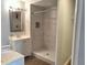 Clean bathroom with tiled shower and single vanity at 33710 Linda Ln, Leesburg, FL 34788