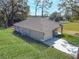 This home has an attached garage, a wide driveway, and well-maintained landscaping at 504 4Th Ave, Wildwood, FL 34785