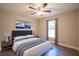 Bedroom with hardwood floors, stylish ceiling fan and natural light from one window at 504 4Th Ave, Wildwood, FL 34785