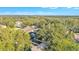 Aerial image reveals the property's landscaped grounds and a peaceful, tree-lined neighborhood at 929 Magnolia Blossom Ct, Apopka, FL 32712