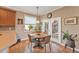 Bright breakfast nook features tile flooring and access to the outdoors at 929 Magnolia Blossom Ct, Apopka, FL 32712