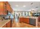 Bright, open kitchen features stainless steel appliances and plenty of counter space at 929 Magnolia Blossom Ct, Apopka, FL 32712