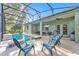 Enjoy the shade of a lanai with a screened pool and patio seating at 929 Magnolia Blossom Ct, Apopka, FL 32712