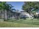 Home with fenced backyard, pool, and basketball court at 1148 Calloway Cir, Clermont, FL 34711