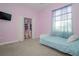 bedroom with twin bed, closet, and unicorn toy at 1148 Calloway Cir, Clermont, FL 34711