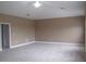 Main bedroom with neutral walls and carpet flooring at 1148 Calloway Cir, Clermont, FL 34711