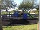 Modern playground with climbing wall and slide at 1148 Calloway Cir, Clermont, FL 34711