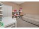 Playroom with white table, chairs, and built-in shelving at 1148 Calloway Cir, Clermont, FL 34711