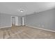 Neutral bedroom with carpeted floors and several doorways creating an open feel at 1961 Nations Way, Saint Cloud, FL 34769