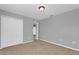 Neutral bedroom showcasing a closet and carpeted flooring and great light at 1961 Nations Way, Saint Cloud, FL 34769