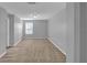 Bedroom featuring neutral walls, carpet flooring, and a large window at 1961 Nations Way, Saint Cloud, FL 34769