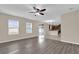 Open concept living area with tile floors that opens to the kitchen and back patio at 1961 Nations Way, Saint Cloud, FL 34769