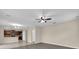 Spacious living room with hard surface floors, open to kitchen at 1961 Nations Way, Saint Cloud, FL 34769