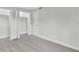 Cozy bedroom with neutral carpet, white walls, and ample closet space at 22103 Sandalwood Dr # 103, Wildwood, FL 34785