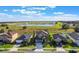 Aerial view of house and surrounding neighborhood at 34045 Alameda Dr, Sorrento, FL 32776