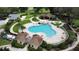 Resort-style pool with lounge chairs and cabanas at 34045 Alameda Dr, Sorrento, FL 32776