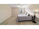Bedroom with a ceiling fan, and wood-look flooring at 2552 English Ivy Cir, The Villages, FL 32162