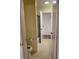 Clean bathroom with shower/tub combo and patterned flooring at 718 Villita Ln, Lady Lake, FL 32159