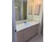 Clean bathroom with a vanity and shower/tub combination at 718 Villita Ln, Lady Lake, FL 32159