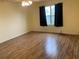Bright living room featuring hardwood floors and a ceiling fan at 718 Villita Ln, Lady Lake, FL 32159