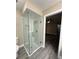 Bathroom with a large glass shower and grey flooring at 1566 Lawndale Cir, Winter Park, FL 32792